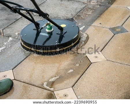Close up Pressure Washing Driveway Surface Cleaning