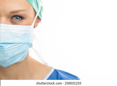 Close Up Of A Pretty, Blue-eyed, Female Surgeon. Half Face Composition. Looking Confident And Professional