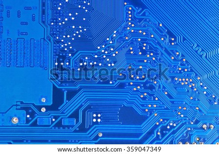 Close up of a printed blue computer circuit board