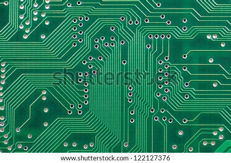 Close up of a printed green computer circuit board