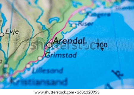 Close up printed map section highlighting Arendal coastline