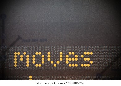 Close up of printed paper surface texture detail shown the word moves.