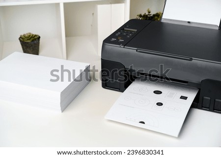 Close up printer copier device on table in the office
