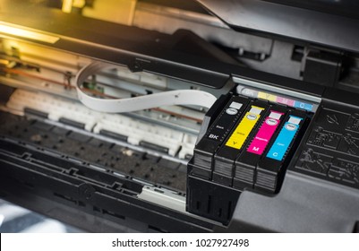 Close up printer ink jet cartridge by selective focus - Shutterstock ID 1027927498