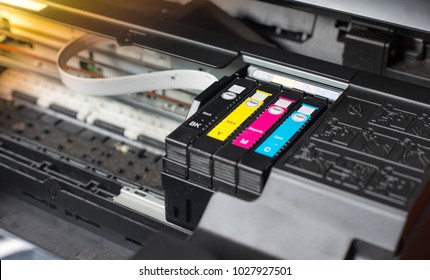 Close up printer ink jet cartridge by selective focus - Shutterstock ID 1027927501