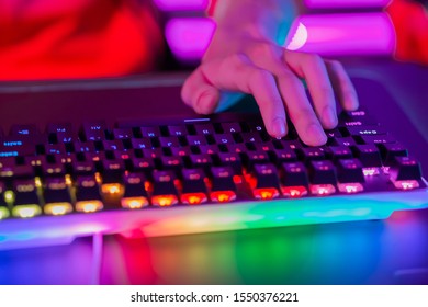 Close Up Of Pro Cyber Sport Gamer Play Game With RGB Keyboard 