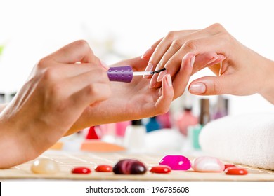 Close Up Of Process Of Manicure At Beauty Salon