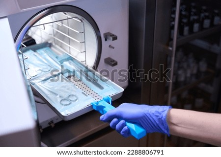 Close up the process of sterilizing medical instruments in an autoclave