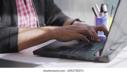 close up of professional business man hand do distant work from home keyboard typing online email using laptop at office desk. Busy male staff employee search new project idea plan on computer device - Powered by Shutterstock