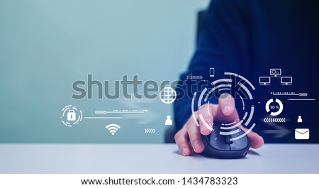 close up professional programmer man hand using mouse cursor for scrolling and working about protection of cyber security and malware attack at computer desktop in office  with technology concept