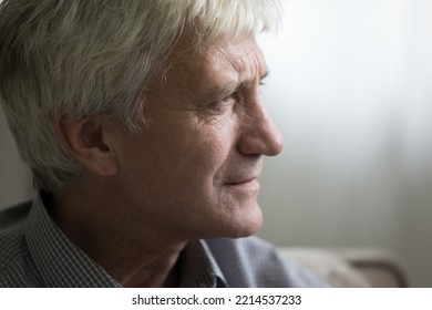 Close Up Profile View Face Of Sad Senior Man Staring Into Distance Looking Pensive, Deep In Thoughts And Life Troubles. Baby Boomer Generation Person Portrait, Loneliness In Older Age, Nostalgia