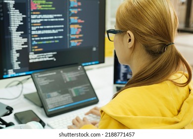 Close up Programmer is coding and programming software. business woman working on computer in the office.