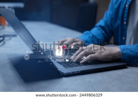 close up programmer man hand type keyboard input code for register and unlock system password on laptop in dark operation room with virtual reality interface for cyber security and safety concept