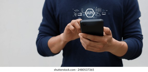 close up programmer man hand use smartphone and show processing and procedure of API software programming to synchronize and transfer data from database to website for technology business concept