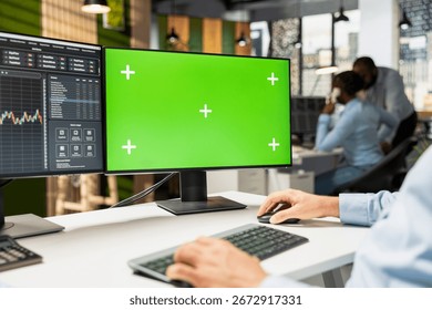 Close up of prop firm trader using mockup computer displaying candlestick graphs with stock market shares volatility. Brokerage company worker using trading platform on chroma key PC