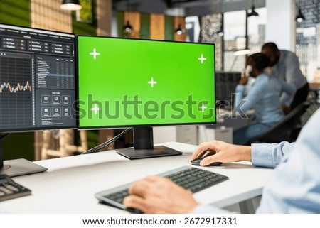Close up of prop firm trader using mockup computer displaying candlestick graphs with stock market shares volatility. Brokerage company worker using trading platform on chroma key PC