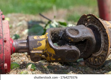 Close Up Of A PTO Shaft With A Missing PTO Guard On A Mower