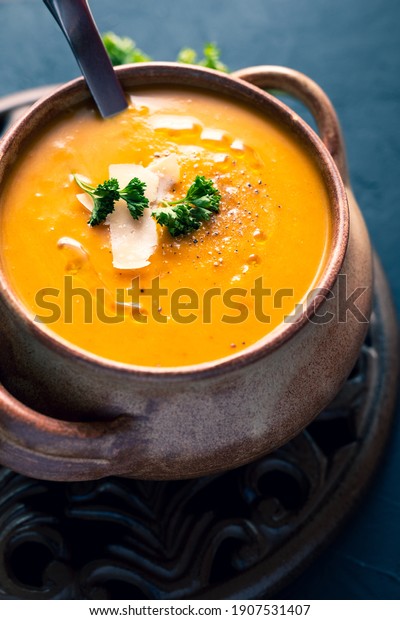 close up of pumpkin\
soup in cooking pot	