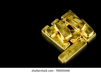 Close Up Pure Gold Bar Ingot Put On The Black Color Leather Surface Background Represent The Business And Finance Concept Idea