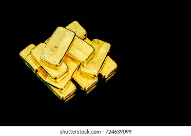 Close Up Pure Gold Bar Ingot Put On The Black Color Leather Surface Background Represent The Business And Finance Concept Idea