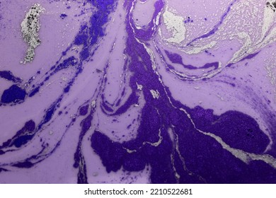 Close Up Of Purple And Silver Powder