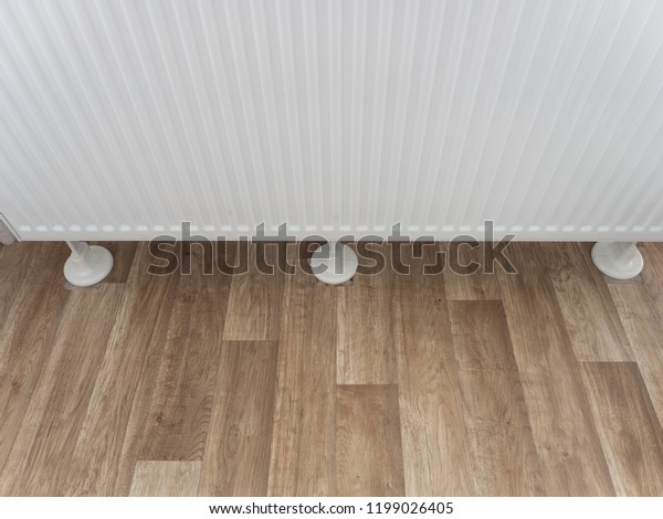 Close Radiator Feet On Vinyl Wooden Stockfoto Jetzt Bearbeiten