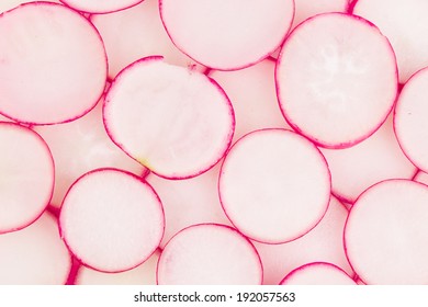 Close Up Of Radish Slices. Whole Background.