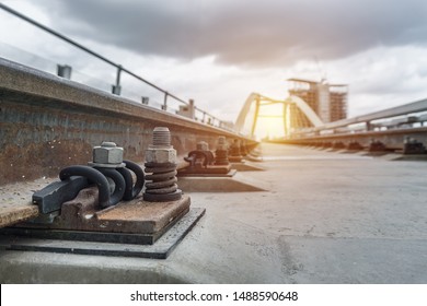 Close Up Rail Fastener For Hold Rail With Concrete Slab Track Of Sky Train. Selective Focus.