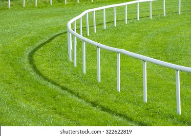 Close Up Railing Bend Of A Horse Race Track