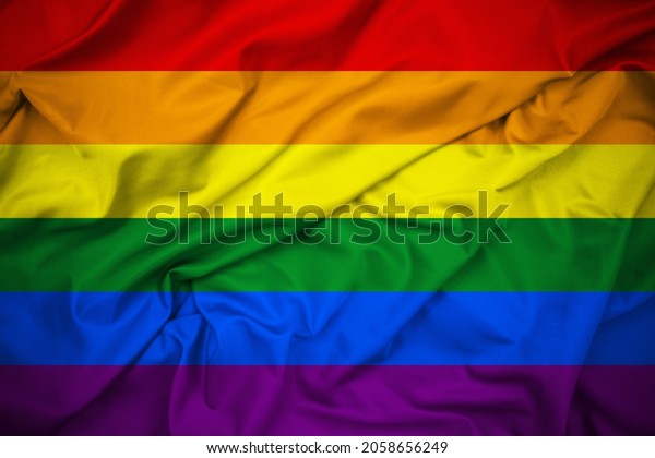 Close Up Rainbow Flag, Symbol of Sexual\
Minorities. Also Known as the Gay Pride Flag or LGBT Pride Flag.\
Six Equal Bands of Red, Orange, Yellow, Green, Blue and Purple.\
Silk Fabric, Detailed\
Texture