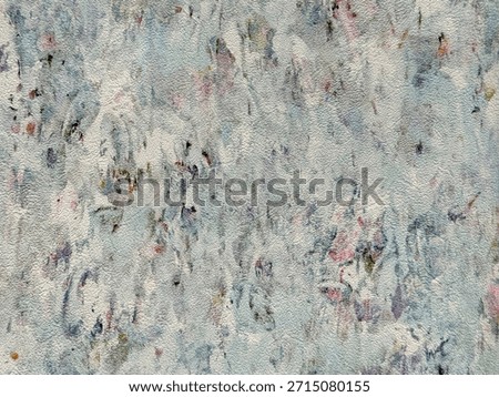 Close up of random decorative washed paint texture in abstract grunge and dirt pattern. In grey, black, gold, yellow, and brown color. Graphic background. Seamless background texture.