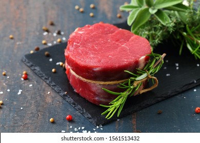 close up raw beef steak on gray background