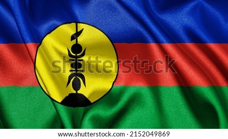 Close up realistic texture fabric textile silk satin flag of New Caledonia waving fluttering background. National symbol of the country. 24th of September, Happy Day concept
