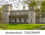 close up rear end with slant park at dundurn castle in city of hamilton ontario canada trees green grass white sky