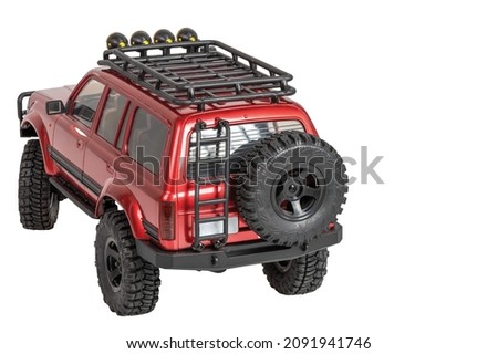 Close up rear view on model car isolated on white background.