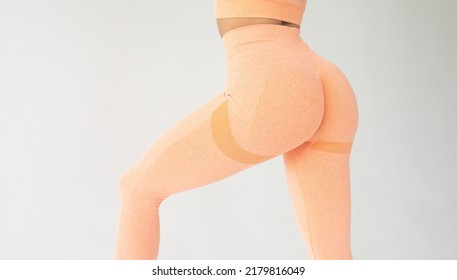 Close up rear view of woman butt in yoga pants. Mid section shot of the backside of woman during workout. - Shutterstock ID 2179816049
