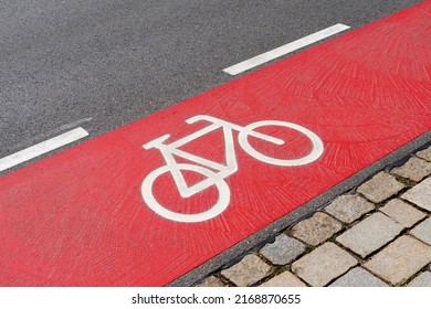 Close up of red bicycle path