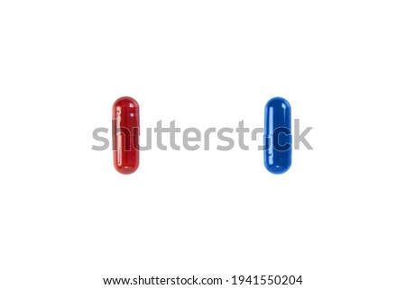 Close up of Red and Blue pills isolated on white background. Choice concept. Clipping path.