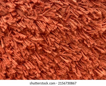 Close Up Of Red Brown Carpet Fringe