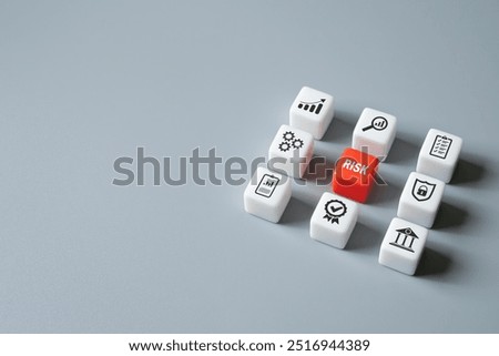 close up at the red cube to identify red danger risk cube among other normal incident. Risk management concept for business and personal planning for risk mitigation with information and decision