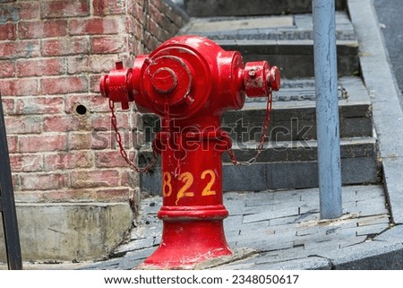 Close up of red fire hydrants on the streets of Central, Hong Kong