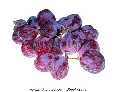 Close up a red grape are withered on white background.