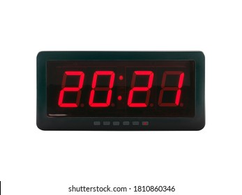 close up red led light illumination numbers 2021 on black digital electric alarm clock display isolated on white background, led sign showing time symbol concept for celebrating the New Year - Powered by Shutterstock