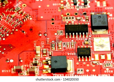 close up of a red printed circuit board