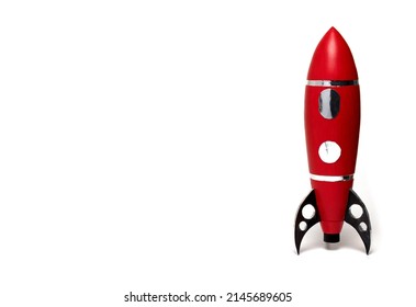 Close up of red toy baby kids rocket with black supports and silver door and window on white background - Powered by Shutterstock