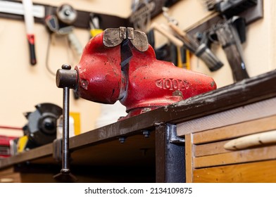 Close Up Of Red Vice Clamp. Heavy Tool Concept. Rusty Old Vise. 