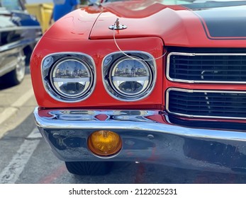 Close Up Of A Red Vintage Car Headlight