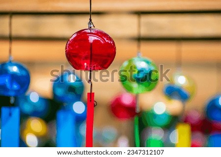 Close up of red windchime