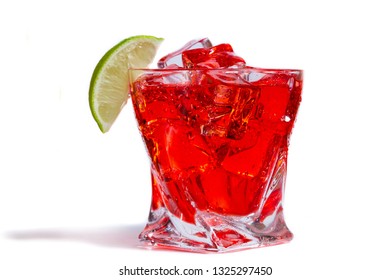 close up of a refreshing classic cocktail with vodka and cranberry juice served on the rocks with a lime wedge garnish isolated on a white background - Powered by Shutterstock