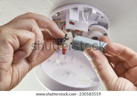 Close Up Of Replacing Battery In Domestic Smoke Alarm Stock photo © 